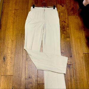 H&M cream colored slacks. Size 4 New with tags. Regular waist Bootcut